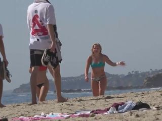 Hot teens play frisbee on the beach-3