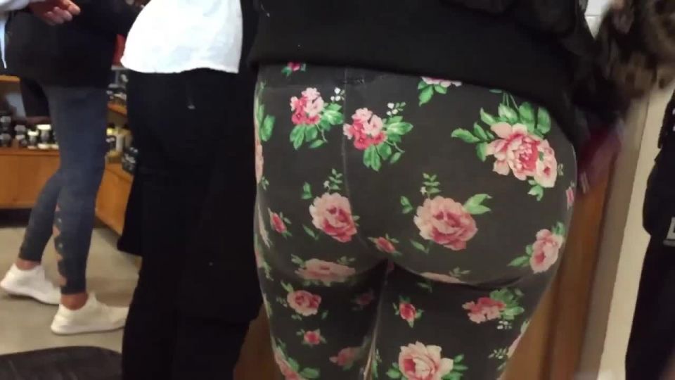 Tight buttocks in flowery  leggings