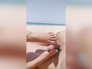 [Amateur] Nude public beach. Risky footjob and handjob by strangers. Almost caught-1