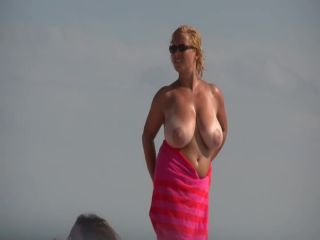Gigantic mature tits on a beach Nudism-4