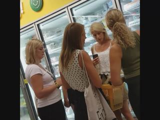 Two upskirts of sexy moms in supermarket-0