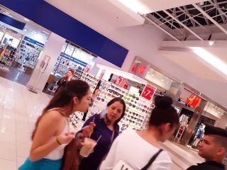 Candid vor latina teen beauty in blue shorts shopping-2