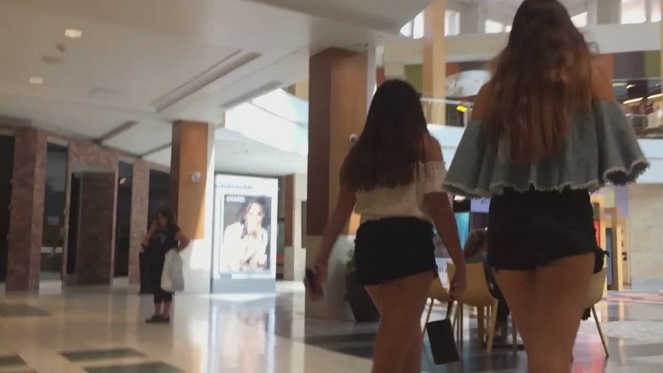 Sassy teen girl revels cheeks in shorts