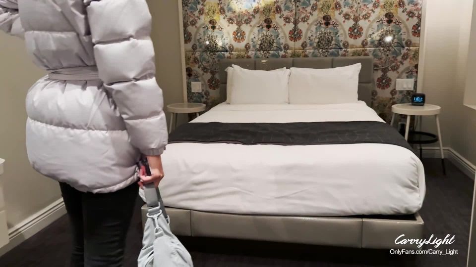 CarryLightStepmother and stepson share a bed in a hotel room