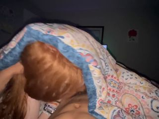 Sexy redhead girlfriend sucking dick under cover while watching TV - Amateur-8