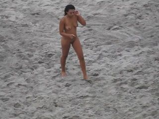 Nude beach, amateur girl shows tits and pussy-7