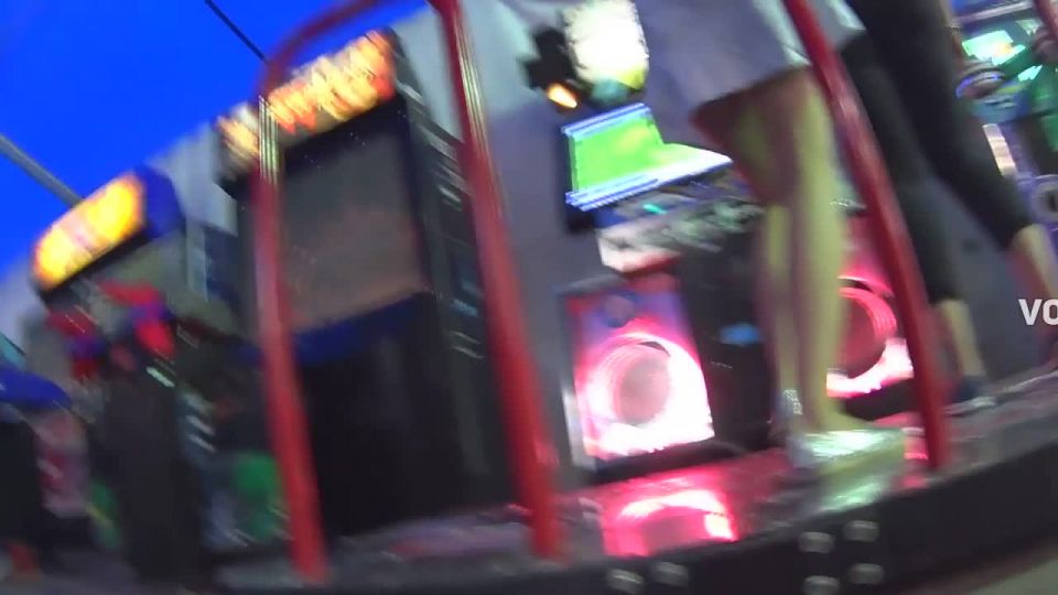 Upskirt of teen girl dancing and playing game Voyeur!