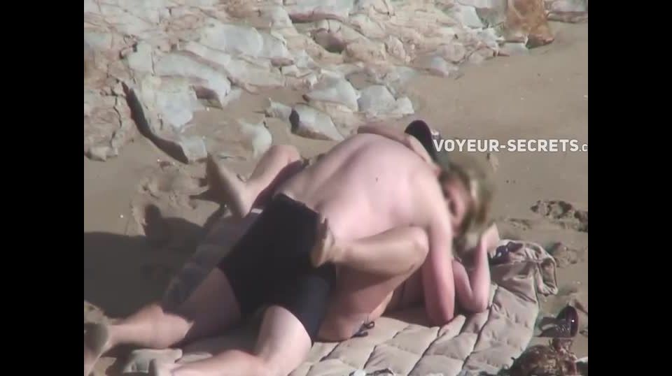 Hard fuck caught on the beach Voyeur!