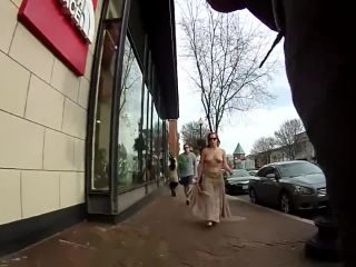 Girl_Walking_Topless_around_Town-1