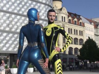 Through the city in a tight latex costume-8