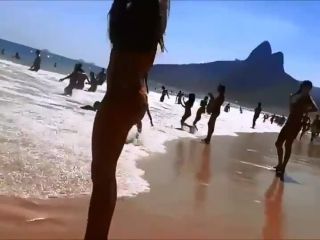 Firm young ass voyeured on a beach  720-7