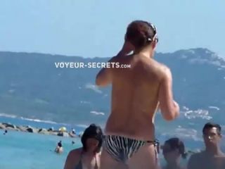 Mature topless woman spied on a beach  720-2