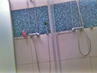 Cute blonde pigtailed girl taking a shower. hidden cam-1