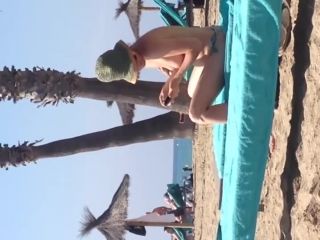 Topless lady talking on a phone-7