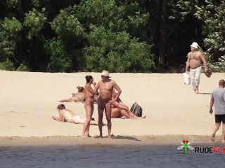 Naked teen naturist lets the water kiss her  body-7