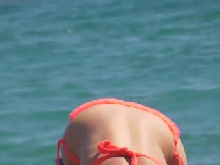 Sexy milf does a handstand on beach-6