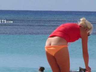 Milf's bikini malfunction on beach-3