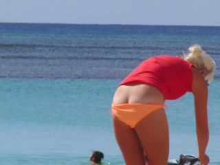 Milf's bikini malfunction on beach-6