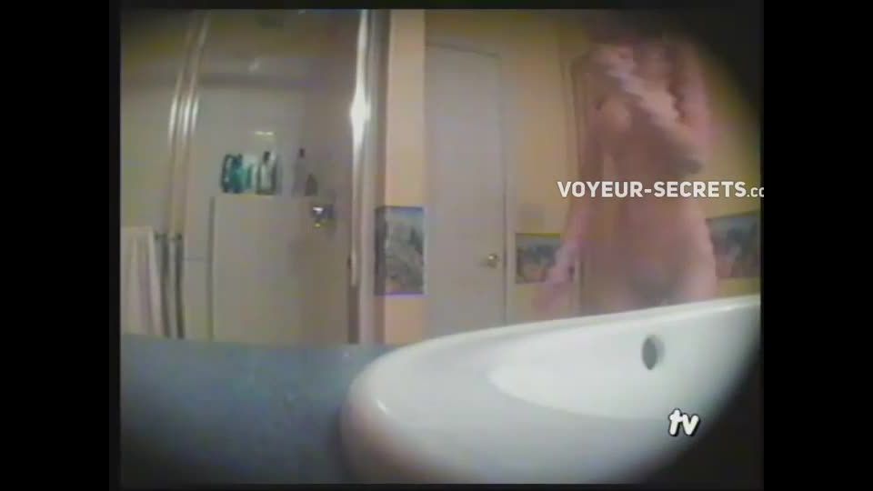 Teen girl showering in the  bathroom