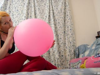 Misha mystique blowing up 16 inch balloon popping it-3